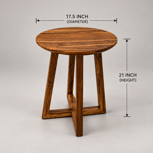 A round wooden side table with three angled legs and a central support beam, shown on a light grey background .