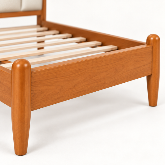 Scalloped Leatherette Wooden Bed in teak wood — close-up of footboard
