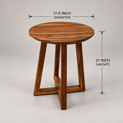 A round wooden side table with three angled legs and a central support beam, shown on a light grey background .