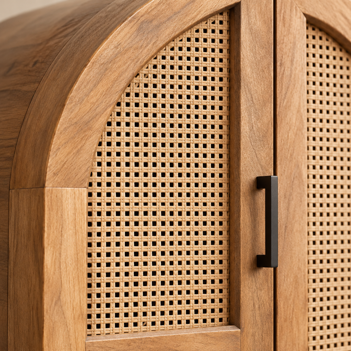Close-up of woven cane door and mango wood grain on arched bar cabinet