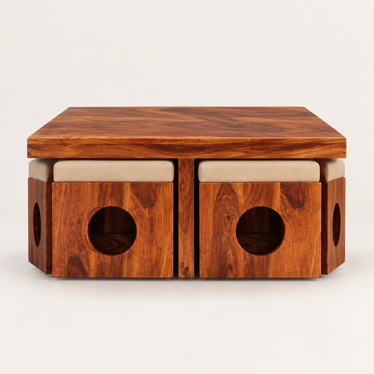 Circle-Cutout Centre Table with Four Beige Stools – angled studio view with stools tucked in