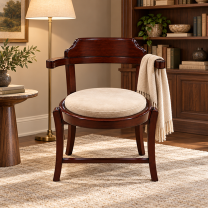 Curved-Back Teak Wood Accent Chair with Round Cushion styled in a home interior