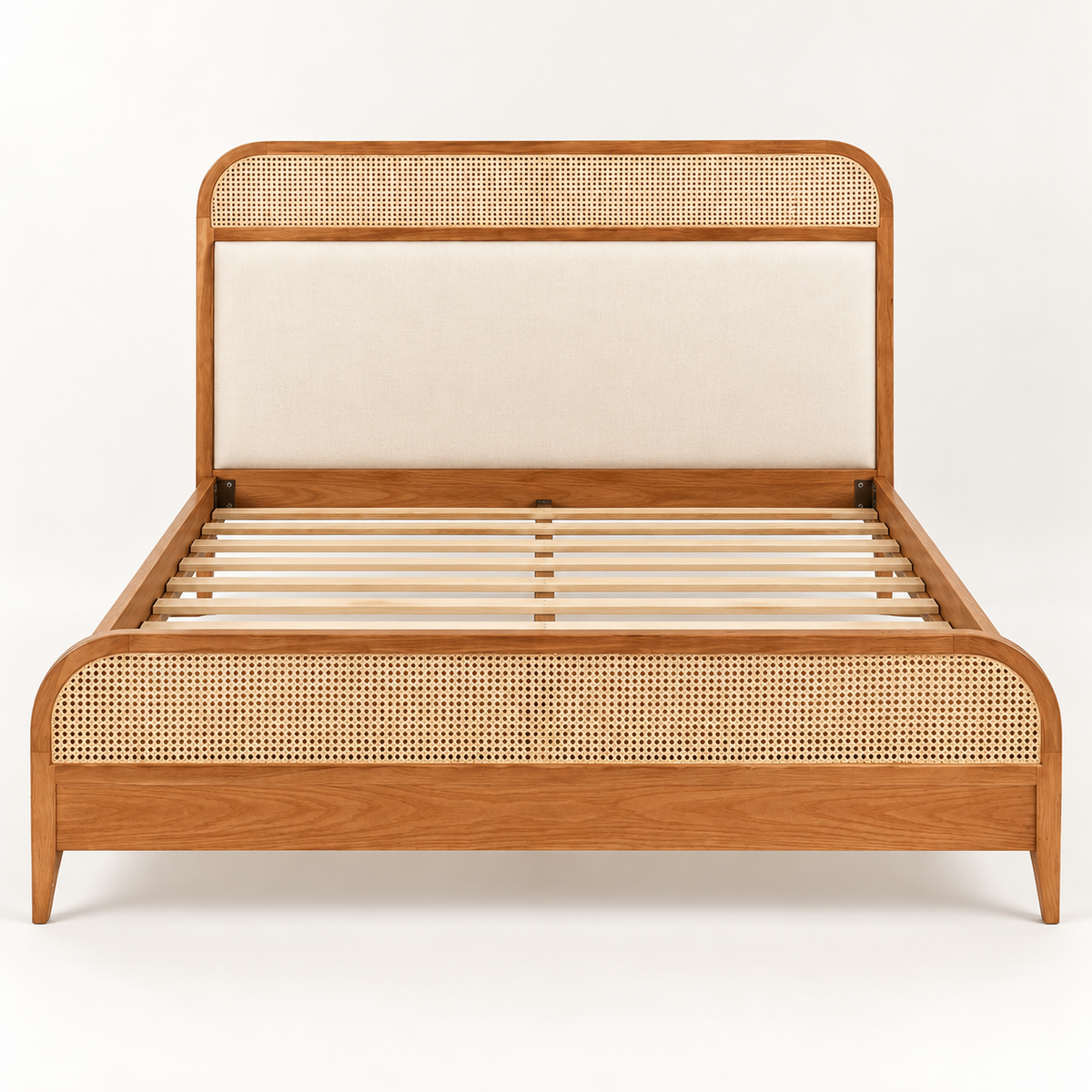 Rounded Cane and Leatherette Bed in teak wood — front studio view of bare frame