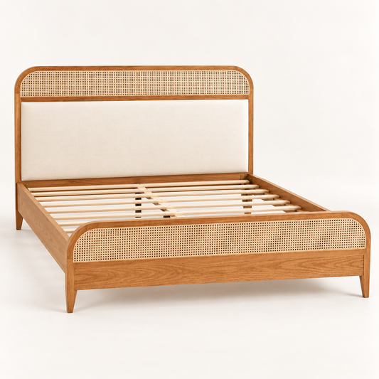 Rounded Cane and Leatherette Bed in teak wood — side studio view of bare frame