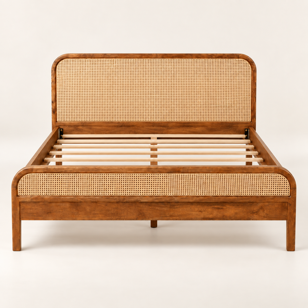 Rounded Cane Wooden Bed in teak wood — front studio view of bare frame