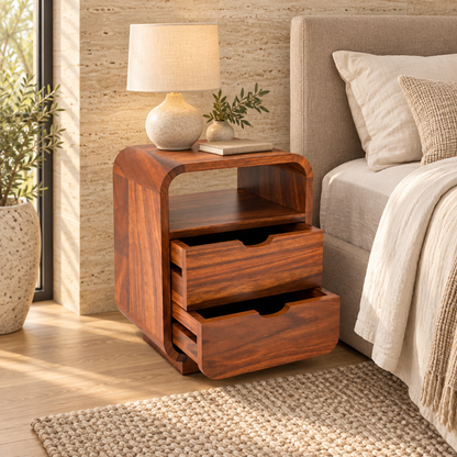 Rounded Bedside Table with Two Drawers styled beside a bed