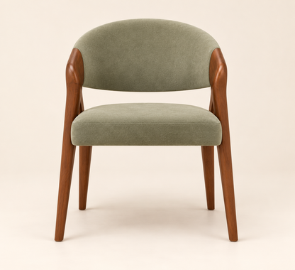 Front view of sage green suede upholstered dining chair