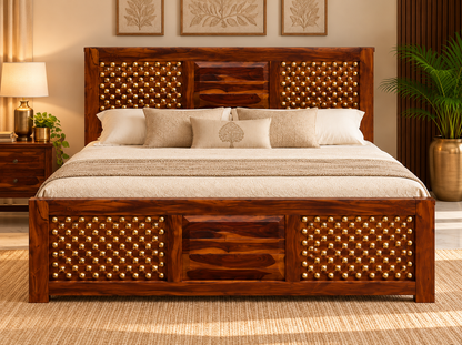 Front lifestyle view of Sheesham wood brass-studded bed with mattress