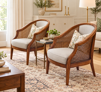 Teak wood cane lounge chair with suede seat in a living room