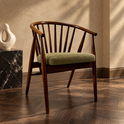 Walnut Spindle-Back Chair with Olive Seat, side view in a styled lifestyle setting.