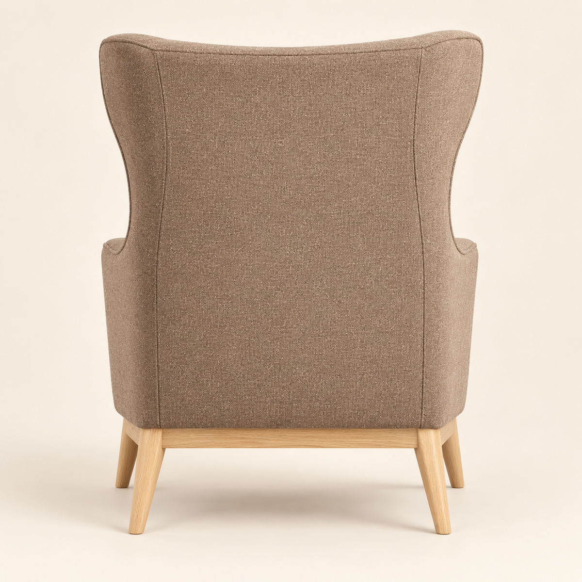 Back view of beige wingback lounge chair